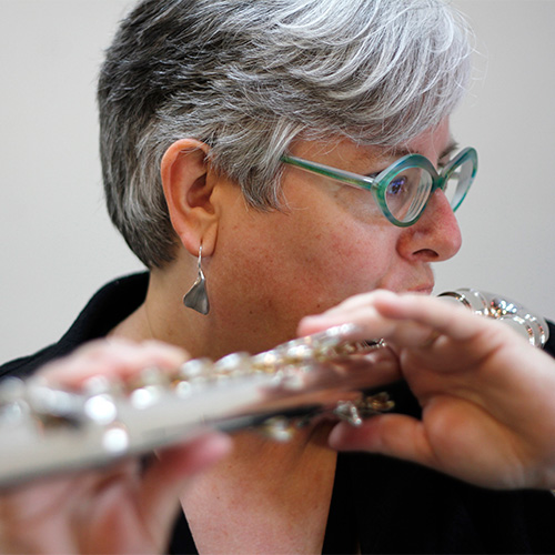 Photo of woman playing the flute (Ellen Waterman)