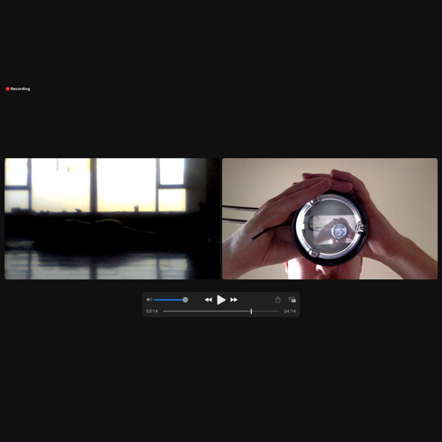 Screenshot of a video clip of a person holding a lens (Jessica Lerner and Andrew Maize)