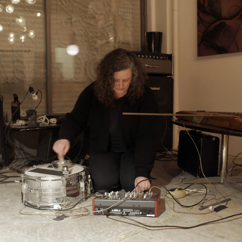 Photo of woman playing a percussion instrument (Doreen Girard)